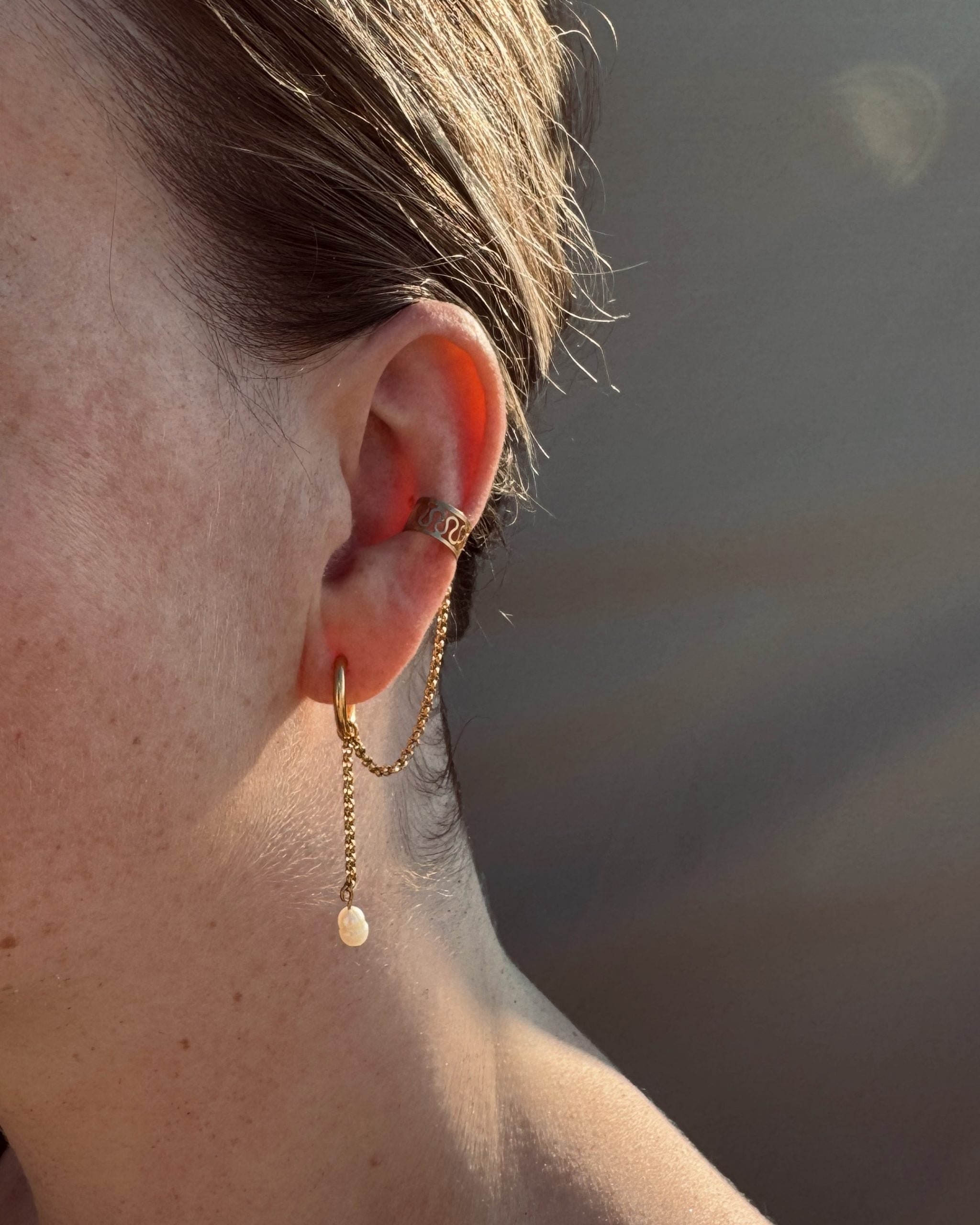 Hanging ear cuff